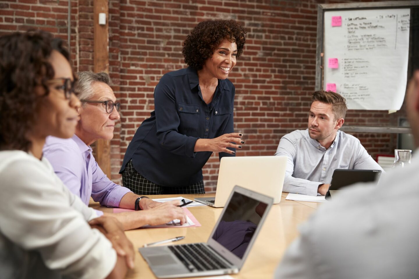 female leading a business meeting